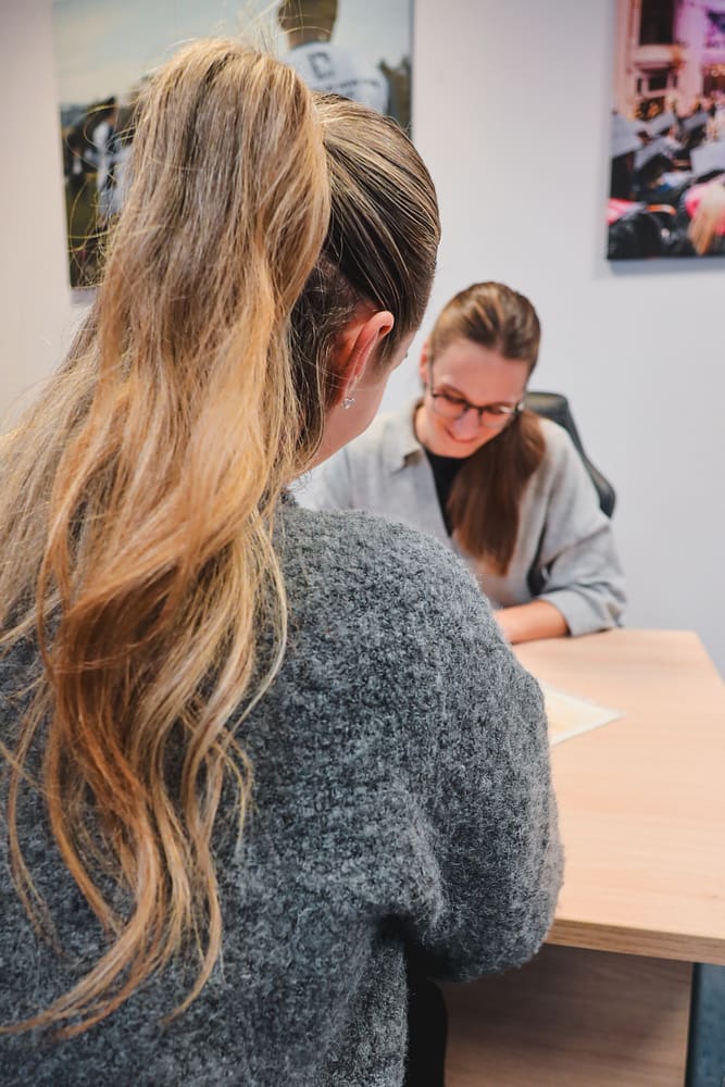 UNYP admissions advisor helping another prospective student